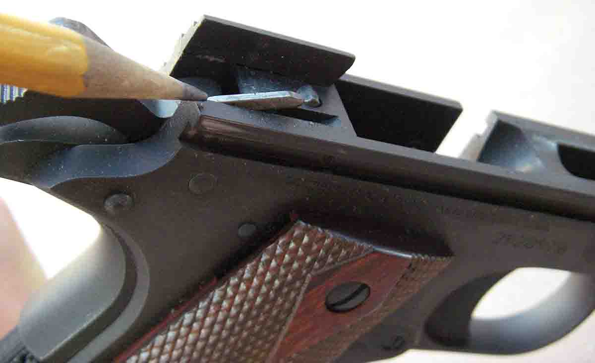 Series 80 pistols received a firing pin block safety that prevents them from firing if dropped on the muzzle. Shown here is the plunger lever, which is a part of the system.